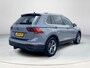 Volkswagen Tiguan 1.5 TSI Elegance Automaat | GEEN AFLEVERKOSTEN | Apple Carplay & Android Auto | Elektrisch wegklapbare trekhaak | Adaptieve Cruise Control | Climate control | Navigatie | Stoel & Stuurwielverwarming | Elektrische kofferbak |
