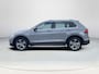 Volkswagen Tiguan 1.5 TSI Elegance Automaat | Rijklaarprijs | Apple Carplay & Android Auto | Elektrisch wegklapbare trekhaak | Adaptieve Cruise Control | Climate control | Navigatie | Stoel & Stuurwielverwarming | Elektrische kofferbak |