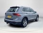 Volkswagen Tiguan 1.5 TSI Elegance Automaat | Rijklaarprijs | Apple Carplay & Android Auto | Elektrisch wegklapbare trekhaak | Adaptieve Cruise Control | Climate control | Navigatie | Stoel & Stuurwielverwarming | Elektrische kofferbak |