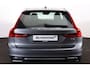Volvo V90 T4 R-Design Business Sport - IntelliSafe Assist & Surround - Harman Kardon audio - DAB - Keyless - Elektr. verstelbare voorstoelen met geheugen - Apple® CarPlay - Android Auto - Navigatiesysteem - Elektr. bedienbare achterklep - Stoelverwarming voor & achter - Stuurwielverwarming - Standkachel - Parkeersensoren voor & achter - Lederlook dashboard - Cross Traffic Alert - CD speler - 18 inch LMV