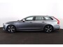 Volvo V90 T4 R-Design Business Sport - IntelliSafe Assist & Surround - Harman Kardon audio - DAB - Keyless - Elektr. verstelbare voorstoelen met geheugen - Apple® CarPlay - Android Auto - Navigatiesysteem - Elektr. bedienbare achterklep - Stoelverwarming voor & achter - Stuurwielverwarming - Standkachel - Parkeersensoren voor & achter - Lederlook dashboard - Cross Traffic Alert - CD speler - 18 inch LMV
