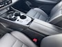 Nissan X-Trail 1.5 e-Power Tekna Automaat / Fabrieksgarantie tot 03-2028 / Navigatie / Lederen Bekleding / Stoel- en Stuurverwarming / Verwarmde Voorruit / Elektrische Kofferbak / Elektrisch Verstelbare Stoelen met Geheugen / 18" LM wielen + All Season banden /
