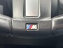 BMW 1-Serie 118i High Executive M Sport Shadow / Cruise Control / M-stuur / Apple Carplay&Android Auto / Led Koplampen / Electronic Climate Control / Voorstoelen Verwarmd / Navigatie / Parkeersensoren Voor&Achter / Hifi Speakers