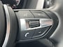 BMW 1-Serie 118i High Executive M Sport Shadow / Cruise Control / M-stuur / Apple Carplay&Android Auto / Led Koplampen / Electronic Climate Control / Voorstoelen Verwarmd / Navigatie / Parkeersensoren Voor&Achter / Hifi Speakers