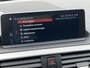 BMW 1-Serie 118i High Executive M Sport Shadow / Cruise Control / M-stuur / Apple Carplay&Android Auto / Led Koplampen / Electronic Climate Control / Voorstoelen Verwarmd / Navigatie / Parkeersensoren Voor&Achter / Hifi Speakers