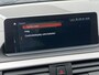 BMW 1-Serie 118i High Executive M Sport Shadow / Cruise Control / M-stuur / Apple Carplay&Android Auto / Led Koplampen / Electronic Climate Control / Voorstoelen Verwarmd / Navigatie / Parkeersensoren Voor&Achter / Hifi Speakers