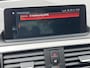 BMW 1-Serie 118i High Executive M Sport Shadow / Cruise Control / M-stuur / Apple Carplay&Android Auto / Led Koplampen / Electronic Climate Control / Voorstoelen Verwarmd / Navigatie / Parkeersensoren Voor&Achter / Hifi Speakers