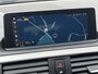 BMW 1-Serie 118i High Executive M Sport Shadow / Cruise Control / M-stuur / Apple Carplay&Android Auto / Led Koplampen / Electronic Climate Control / Voorstoelen Verwarmd / Navigatie / Parkeersensoren Voor&Achter / Hifi Speakers