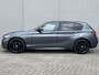 BMW 1-Serie 118i High Executive M Sport Shadow / Cruise Control / M-stuur / Apple Carplay&Android Auto / Led Koplampen / Electronic Climate Control / Voorstoelen Verwarmd / Navigatie / Parkeersensoren Voor&Achter / Hifi Speakers