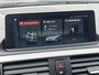 BMW 1-Serie 118i High Executive M Sport Shadow / Cruise Control / M-stuur / Apple Carplay&Android Auto / Led Koplampen / Electronic Climate Control / Voorstoelen Verwarmd / Navigatie / Parkeersensoren Voor&Achter / Hifi Speakers