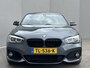 BMW 1-Serie 118i High Executive M Sport Shadow / Cruise Control / M-stuur / Apple Carplay&Android Auto / Led Koplampen / Electronic Climate Control / Voorstoelen Verwarmd / Navigatie / Parkeersensoren Voor&Achter / Hifi Speakers