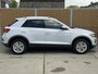 Volkswagen T-Roc 1.0 TSI Style Trekhaak | Climate control | Navigatiesysteem | Cruise control adaptief | DAB ontvangst | Getint glas | Smartphone intergratie | Parkeersensoren voor en achter