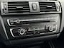 BMW 1-Serie 118i Sport Line 5 Deurs | Xenon | Lichtmetaal | Airco | Winterset