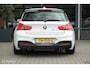 BMW 1-Serie M140i High Executive | Schuif-kanteldak | Harman Kardon | Camera | NL auto | 19 inch OZ Superturismo Aero | dealer onderhouden | Cruise