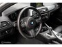 BMW 1-Serie M140i High Executive | Schuif-kanteldak | Harman Kardon | Camera | NL auto | 19 inch OZ Superturismo Aero | dealer onderhouden | Cruise