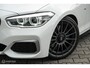 BMW 1-Serie M140i High Executive | Schuif-kanteldak | Harman Kardon | Camera | NL auto | 19 inch OZ Superturismo Aero | dealer onderhouden | Cruise