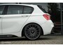 BMW 1-Serie M140i High Executive | Schuif-kanteldak | Harman Kardon | Camera | NL auto | 19 inch OZ Superturismo Aero | dealer onderhouden | Cruise
