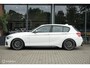 BMW 1-Serie M140i High Executive | Schuif-kanteldak | Harman Kardon | Camera | NL auto | 19 inch OZ Superturismo Aero | dealer onderhouden | Cruise