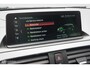 BMW 1-Serie M140i High Executive | Schuif-kanteldak | Harman Kardon | Camera | NL auto | 19 inch OZ Superturismo Aero | dealer onderhouden | Cruise