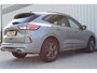 Ford Kuga 2.5 PHEV ST-Line | Incl. 12 maanden garantie | Virtual cockpit | DAB+ | Navigatie | Achteruitrijcamera | Apple carplay/ Android auto | Zwart hemel | 18" velgen | Parkeersensoren voor en achter | Keyless entry & go |