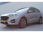 Ford Kuga 2.5 PHEV ST-Line | Incl. 12 maanden garantie | Virtual cockpit | DAB+ | Navigatie | Achteruitrijcamera | Apple carplay/ Android auto | Zwart hemel | 18" velgen | Parkeersensoren voor en achter | Keyless entry & go |