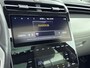 Hyundai Tucson 1.6 T-GDI PHEV Premium Sky 4WD | Schuif kanteldak | Trekhaak 1350kg |  Dodehoek detectie | Stoel verwarming & verkoeling | Navigatie |