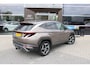 Hyundai Tucson 1.6 T-GDI HEV Premium | Trekhaak | | Achterbank verwarmd | Achteruitrij assistent | Airco (automatisch)