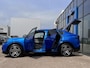 Ford Capri Premium Extended Range AWD 79 kWh Elek. Trekhaak Panodak Warmtepomp Adaptieve Cruise AGR-stoelen Stoel/stuurverwarming Blind-Spot B&O 20'' Velgen *Full-Options*