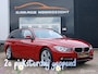 BMW 3-Serie Touring 320i Upgrade Edition /Navigatie/Leder