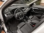 BMW X1 sDrive18i | Handbak | Uniek | PearlWeiss | Leer | Nav | All-black! | Privacy glass