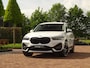 BMW X1 sDrive18i | Handbak | Uniek | PearlWeiss | Leer | Nav | All-black! | Privacy glass