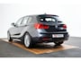 BMW 1-Serie 118i Edition M Sport Shadow High Executive Middenarmsteun - PDC Voor/achter - Cruise Control - Sportstoelen - Elektrisch verstelbare lendensteunen - Elektrisch verwarmde voorstoelen - Navigatiesysteem Business -
