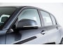 BMW 1-Serie 118i Edition M Sport Shadow High Executive Middenarmsteun - PDC Voor/achter - Cruise Control - Sportstoelen - Elektrisch verstelbare lendensteunen - Elektrisch verwarmde voorstoelen - Navigatiesysteem Business -
