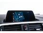 BMW 1-Serie 118i Edition M Sport Shadow High Executive Middenarmsteun - PDC Voor/achter - Cruise Control - Sportstoelen - Elektrisch verstelbare lendensteunen - Elektrisch verwarmde voorstoelen - Navigatiesysteem Business -