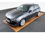 BMW 1-Serie 118i Edition M Sport Shadow High Executive Middenarmsteun - PDC Voor/achter - Cruise Control - Sportstoelen - Elektrisch verstelbare lendensteunen - Elektrisch verwarmde voorstoelen - Navigatiesysteem Business -