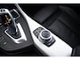 BMW 1-Serie 118i Edition M Sport Shadow High Executive Middenarmsteun - PDC Voor/achter - Cruise Control - Sportstoelen - Elektrisch verstelbare lendensteunen - Elektrisch verwarmde voorstoelen - Navigatiesysteem Business -