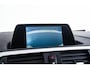 BMW 1-Serie 118i Edition M Sport Shadow High Executive Middenarmsteun - PDC Voor/achter - Cruise Control - Sportstoelen - Elektrisch verstelbare lendensteunen - Elektrisch verwarmde voorstoelen - Navigatiesysteem Business -