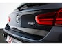 BMW 1-Serie 118i Edition M Sport Shadow High Executive Middenarmsteun - PDC Voor/achter - Cruise Control - Sportstoelen - Elektrisch verstelbare lendensteunen - Elektrisch verwarmde voorstoelen - Navigatiesysteem Business -