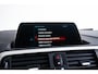 BMW 1-Serie 118i Edition M Sport Shadow High Executive Middenarmsteun - PDC Voor/achter - Cruise Control - Sportstoelen - Elektrisch verstelbare lendensteunen - Elektrisch verwarmde voorstoelen - Navigatiesysteem Business -