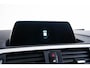 BMW 1-Serie 118i Edition M Sport Shadow High Executive Middenarmsteun - PDC Voor/achter - Cruise Control - Sportstoelen - Elektrisch verstelbare lendensteunen - Elektrisch verwarmde voorstoelen - Navigatiesysteem Business -