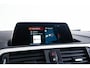 BMW 1-Serie 118i Edition M Sport Shadow High Executive Middenarmsteun - PDC Voor/achter - Cruise Control - Sportstoelen - Elektrisch verstelbare lendensteunen - Elektrisch verwarmde voorstoelen - Navigatiesysteem Business -