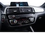 BMW 1-Serie 118i Edition M Sport Shadow High Executive Middenarmsteun - PDC Voor/achter - Cruise Control - Sportstoelen - Elektrisch verstelbare lendensteunen - Elektrisch verwarmde voorstoelen - Navigatiesysteem Business -