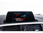 BMW 1-Serie 118i Edition M Sport Shadow High Executive Middenarmsteun - PDC Voor/achter - Cruise Control - Sportstoelen - Elektrisch verstelbare lendensteunen - Elektrisch verwarmde voorstoelen - Navigatiesysteem Business -
