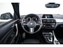 BMW 1-Serie 118i Edition M Sport Shadow High Executive Middenarmsteun - PDC Voor/achter - Cruise Control - Sportstoelen - Elektrisch verstelbare lendensteunen - Elektrisch verwarmde voorstoelen - Navigatiesysteem Business -