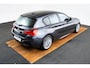 BMW 1-Serie 118i Edition M Sport Shadow High Executive Middenarmsteun - PDC Voor/achter - Cruise Control - Sportstoelen - Elektrisch verstelbare lendensteunen - Elektrisch verwarmde voorstoelen - Navigatiesysteem Business -