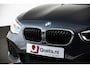 BMW 1-Serie 118i Edition M Sport Shadow High Executive Middenarmsteun - PDC Voor/achter - Cruise Control - Sportstoelen - Elektrisch verstelbare lendensteunen - Elektrisch verwarmde voorstoelen - Navigatiesysteem Business -