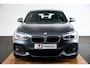 BMW 1-Serie 118i Edition M Sport Shadow High Executive Middenarmsteun - PDC Voor/achter - Cruise Control - Sportstoelen - Elektrisch verstelbare lendensteunen - Elektrisch verwarmde voorstoelen - Navigatiesysteem Business -