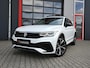 Volkswagen Tiguan 1.4 TSI eHybrid R-Line Business+ 245PK | Pano | Matrix IQ Led | Trekhaak | 360 | Head-Up | ACC | Alcantara | Stoel & Stuurwielverwarming | 20'' | Keyless | Ambient | Digitaal Dash | Carplay / Android Auto | Nav | Flippers