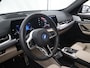 BMW iX1 eDrive20 67 kWh | M-Pakket | SOH 98% | Harman/Kardon | Ele. verstelbare stoelen + Geheugen | Panoramdak | Sportstoelen | Curved Display | 360 Camera | Trekhaak | HUD |