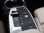 BMW iX1 eDrive20 67 kWh | M-Pakket | SOH 98% | Harman/Kardon | Ele. verstelbare stoelen + Geheugen | Panoramdak | Sportstoelen | Curved Display | 360 Camera | Trekhaak | HUD |